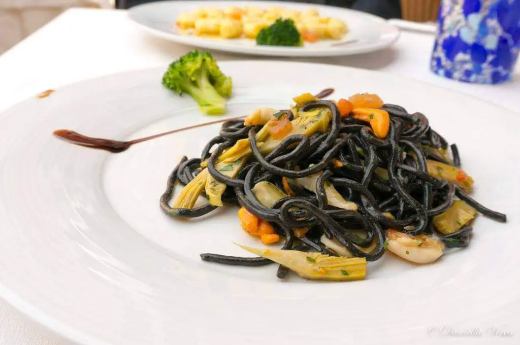Image of a seafood dish at Ostaria Boccardoro restaurant