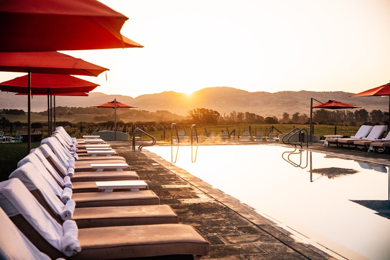 Outdoor pool and sunset view panoram at Carneros Resort and Spa