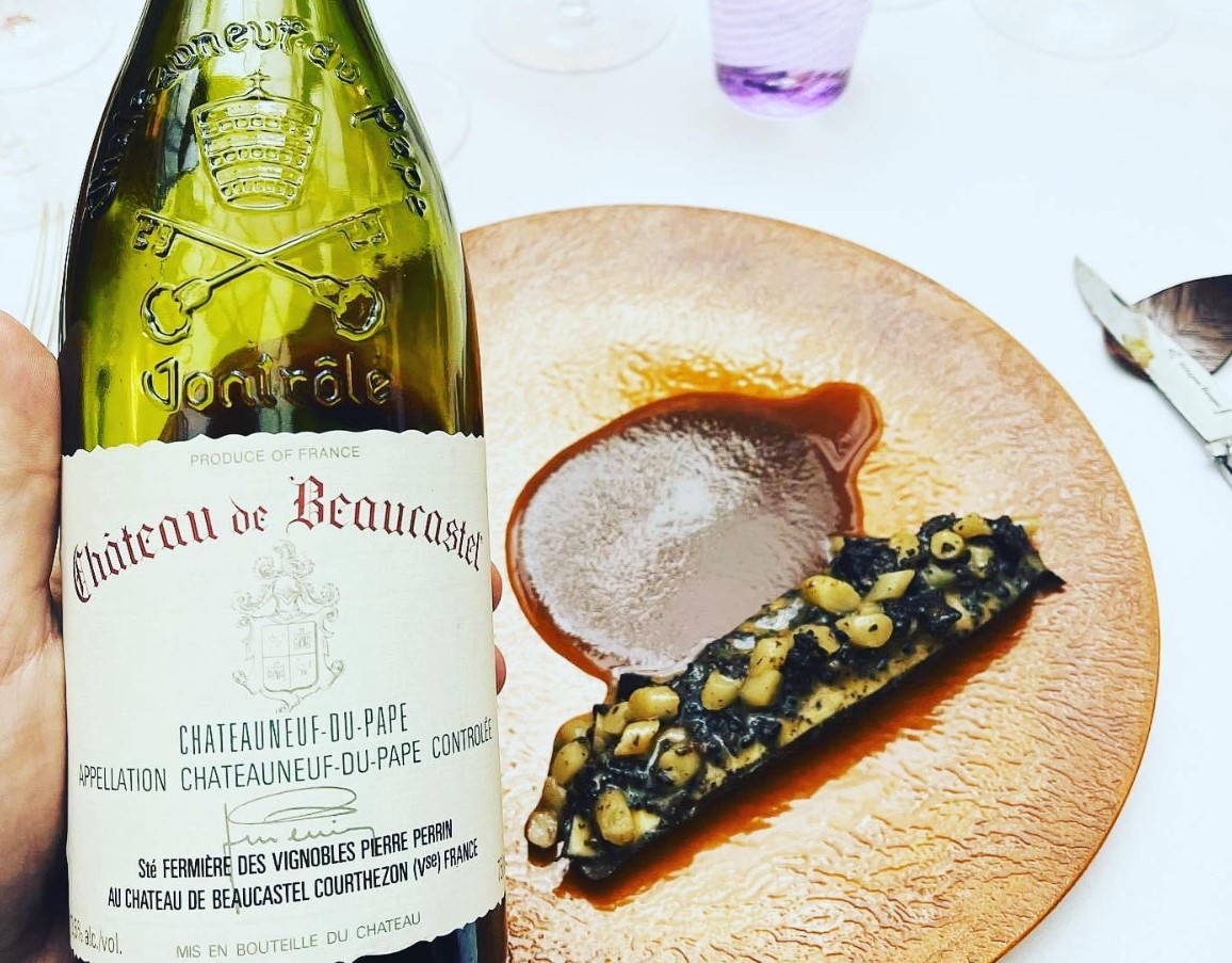 image of a bottle of Château de Beaucastel paired with nicely presented food