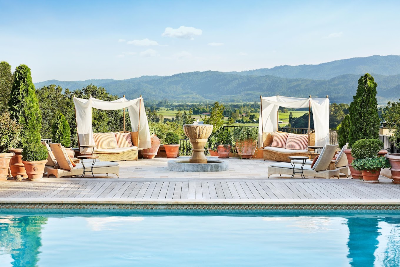 Image of a pool and relaxation place view of the surrounding area from Auberge du Soleil Resort