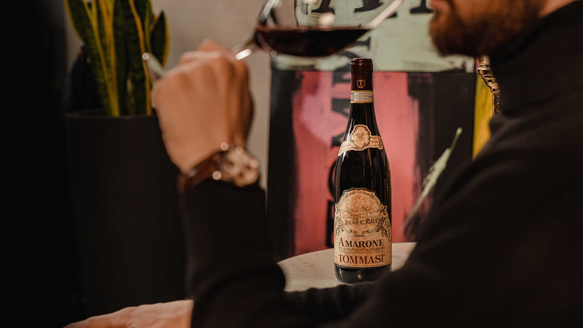 Image of a man tasting Tommasi Amarone 