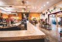 featured image of interior of a Three Brothers Wineries and Estates tasting room